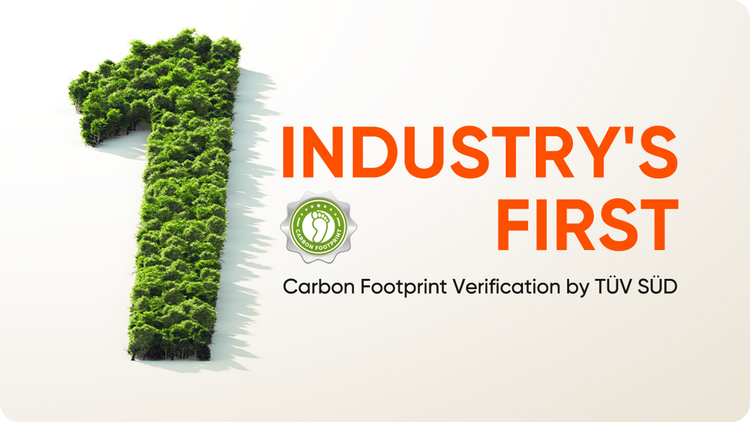 The image features a bold "1" made from green foliage alongside the text "Industry's First Carbon Footprint Verification by TÜV SÜD" and a green circular emblem. It sits on a beige gradient background, echoing sustainability themes similar to Jackery's Explorer 2000 Plus Portable Power Station.